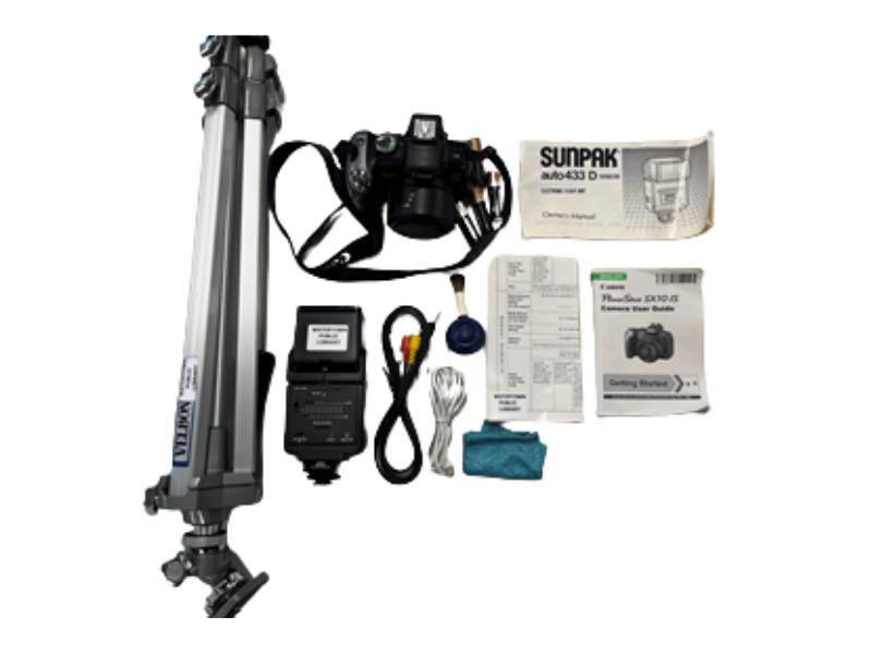 Camera with tripod and other equipment perfect for taking your own photographs