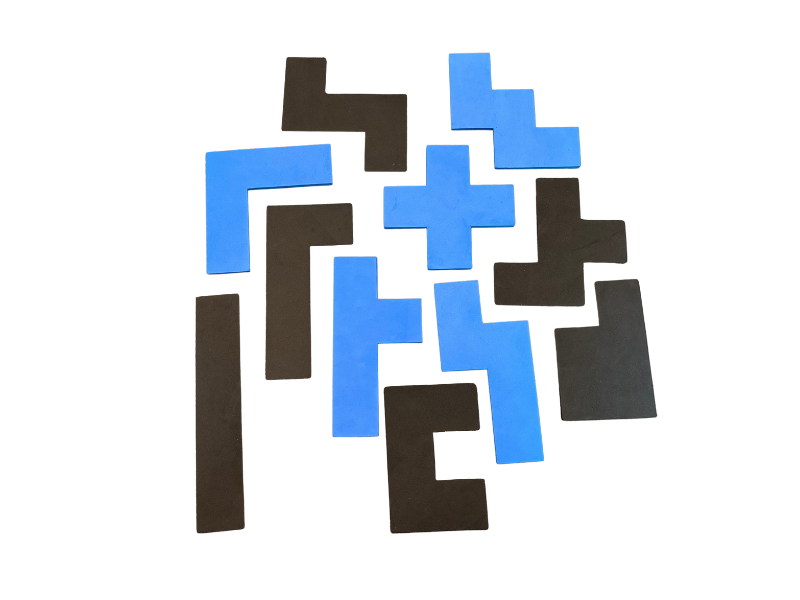 Dark brown and blue pentominoes different various shapes