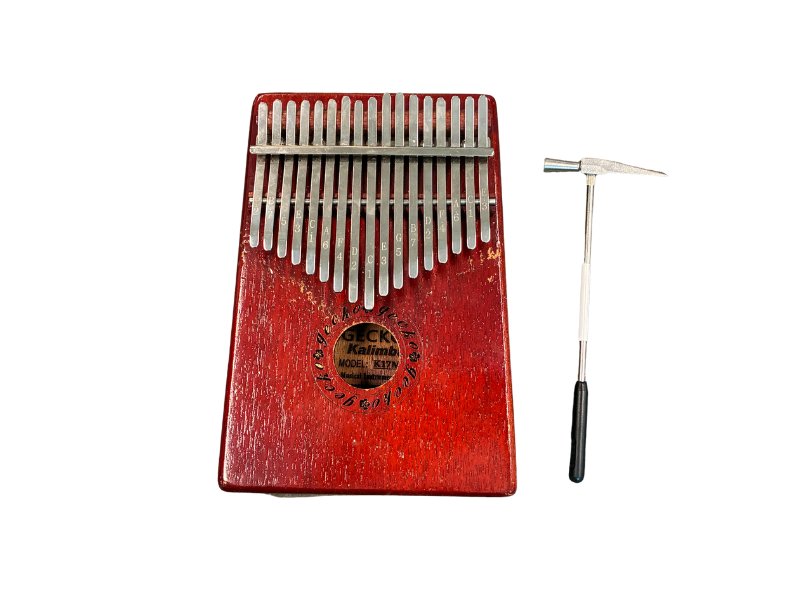 Musical instrument consisting of wooden box and metal tines.