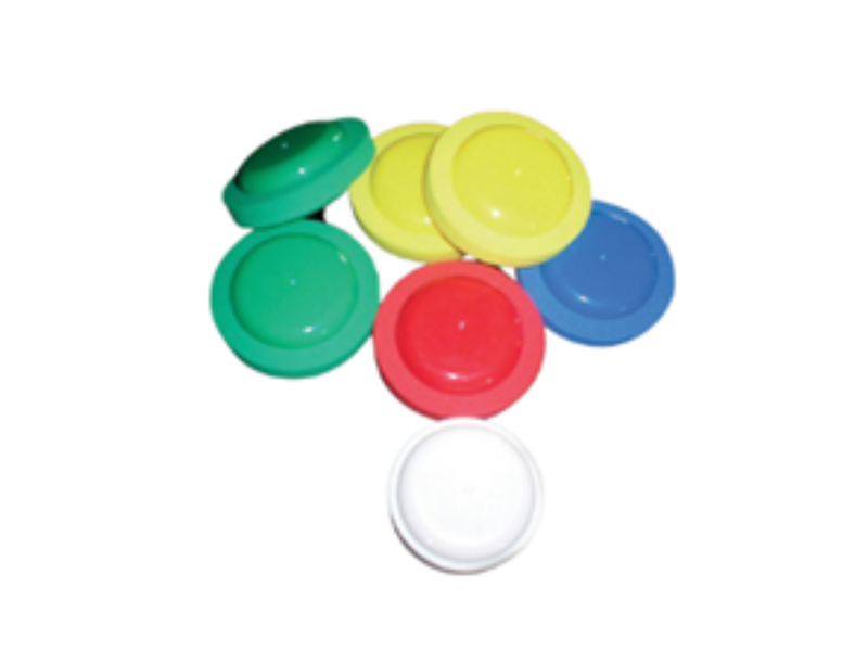 Bocce discs in green, yellow, red, blue and white.